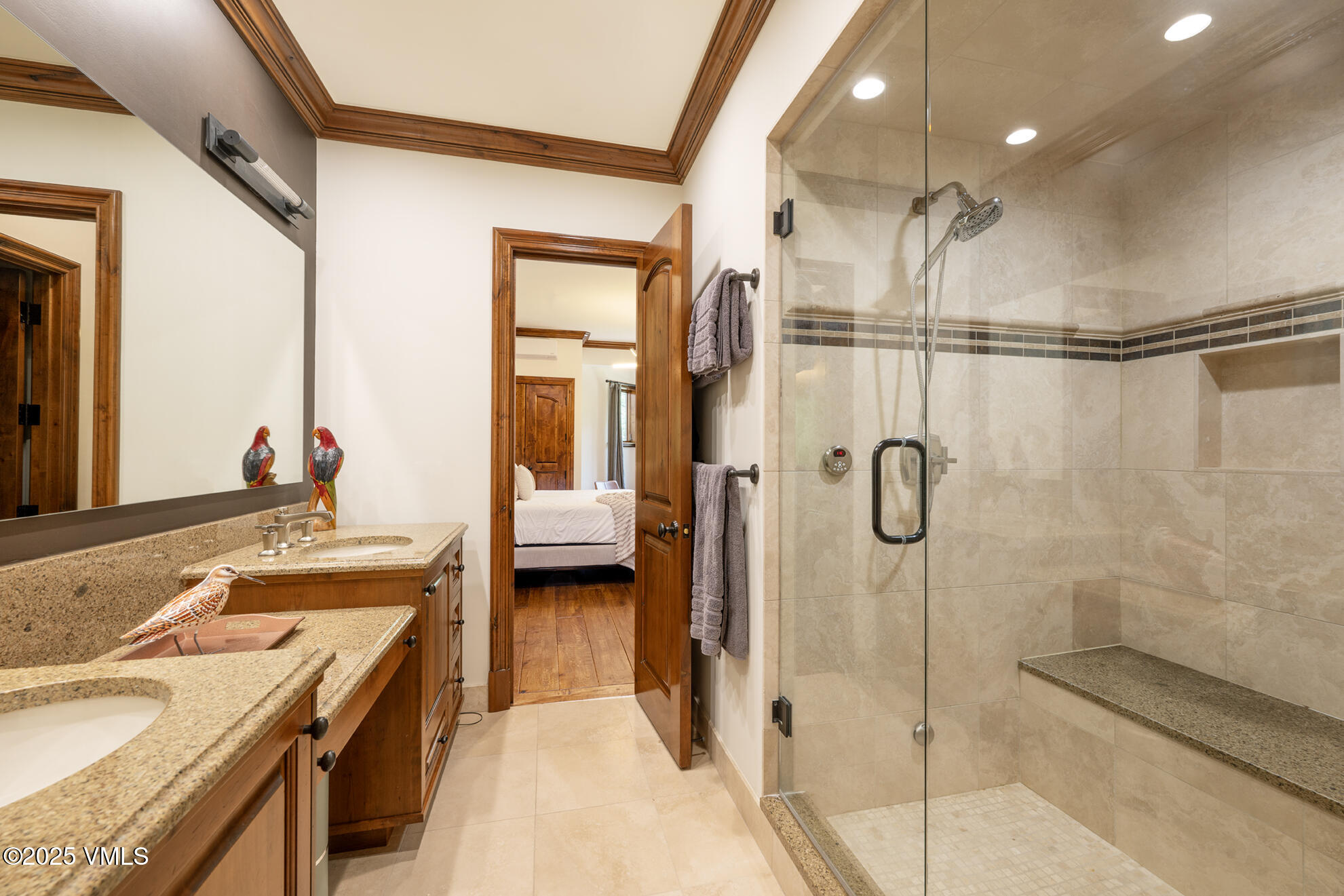 185 Forest Road Vail, CO 81657 - Photo 10 of 13 a bathroom with a tub sink mirror and shower