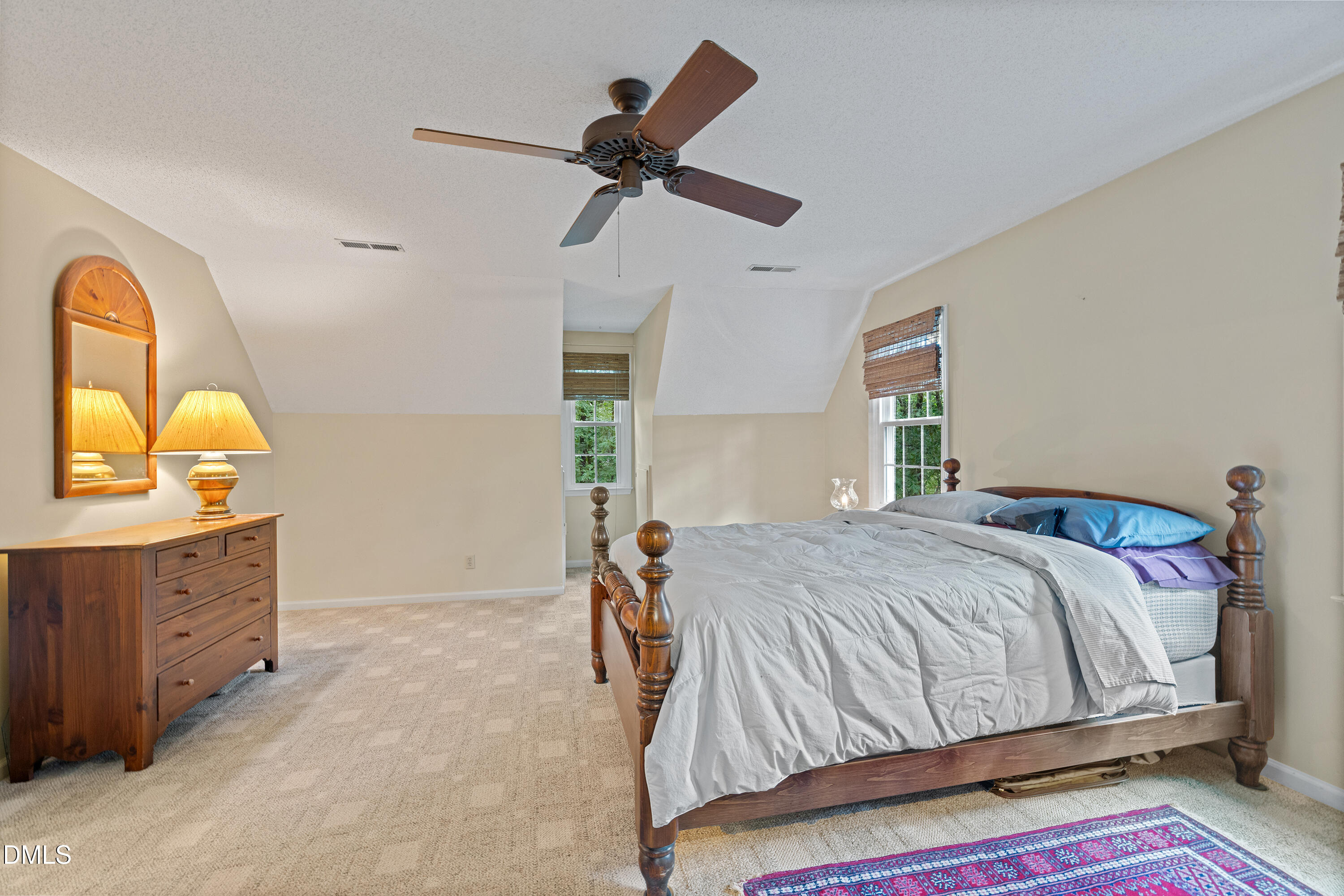 5216 Bridget Drive Raleigh, NC 27603 - Photo 14 of 30 a bedroom with a bed and a dresser