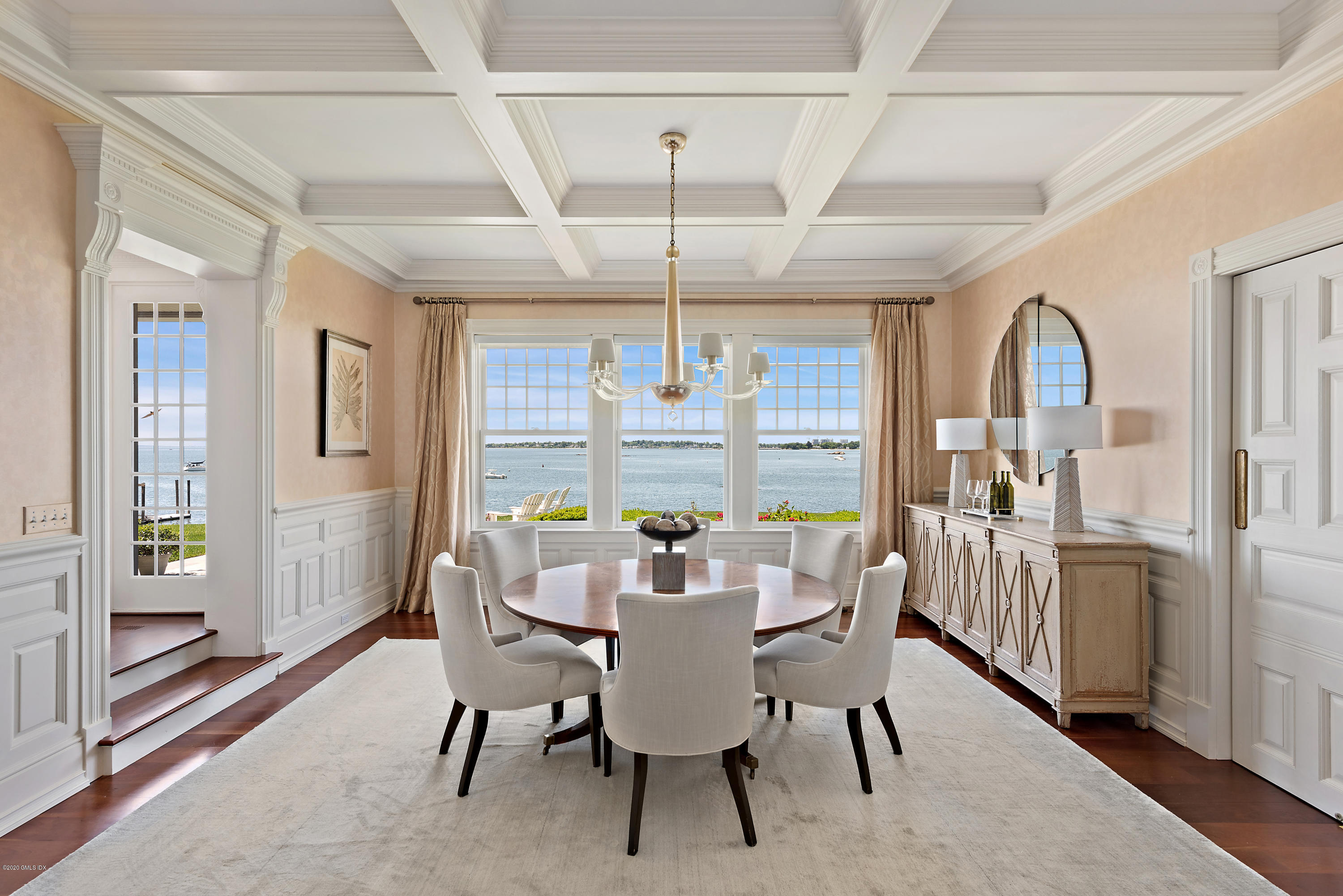 224 Long Neck Point Road Darien, CT 06820 - Photo 11 of 33 a view of a dining room with furniture window and outside view