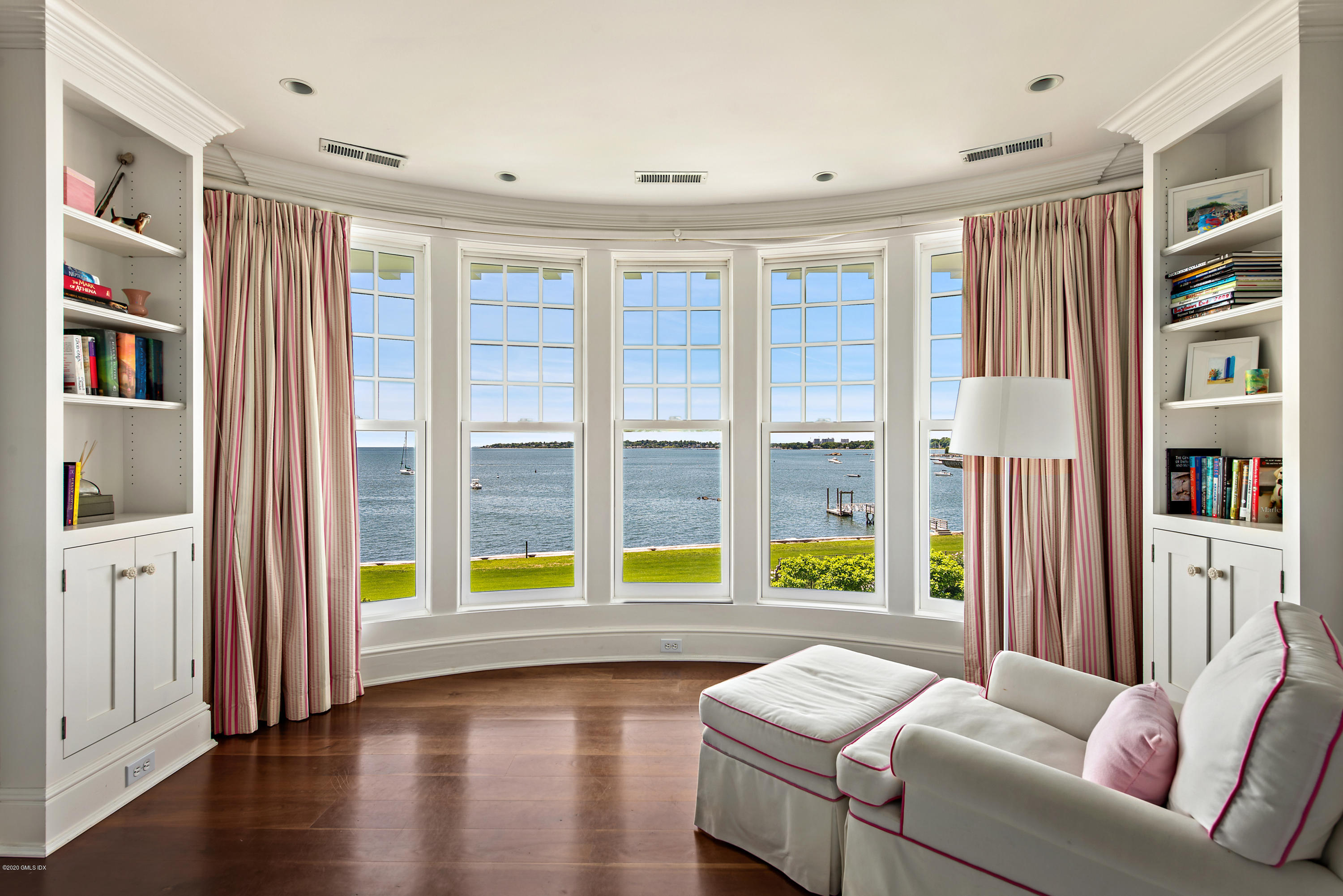 224 Long Neck Point Road Darien, CT 06820 - Photo 24 of 33 a living room with furniture and a window