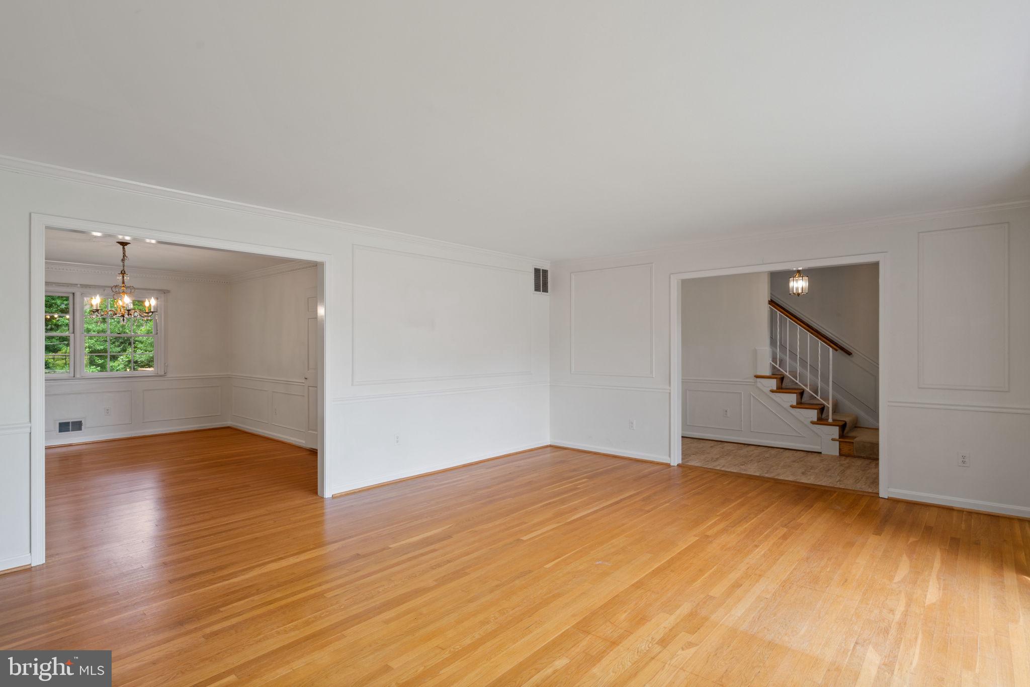 6716 Baron Road McLean, VA 22101 - Photo 14 of 41 an empty room with wooden floor and windows