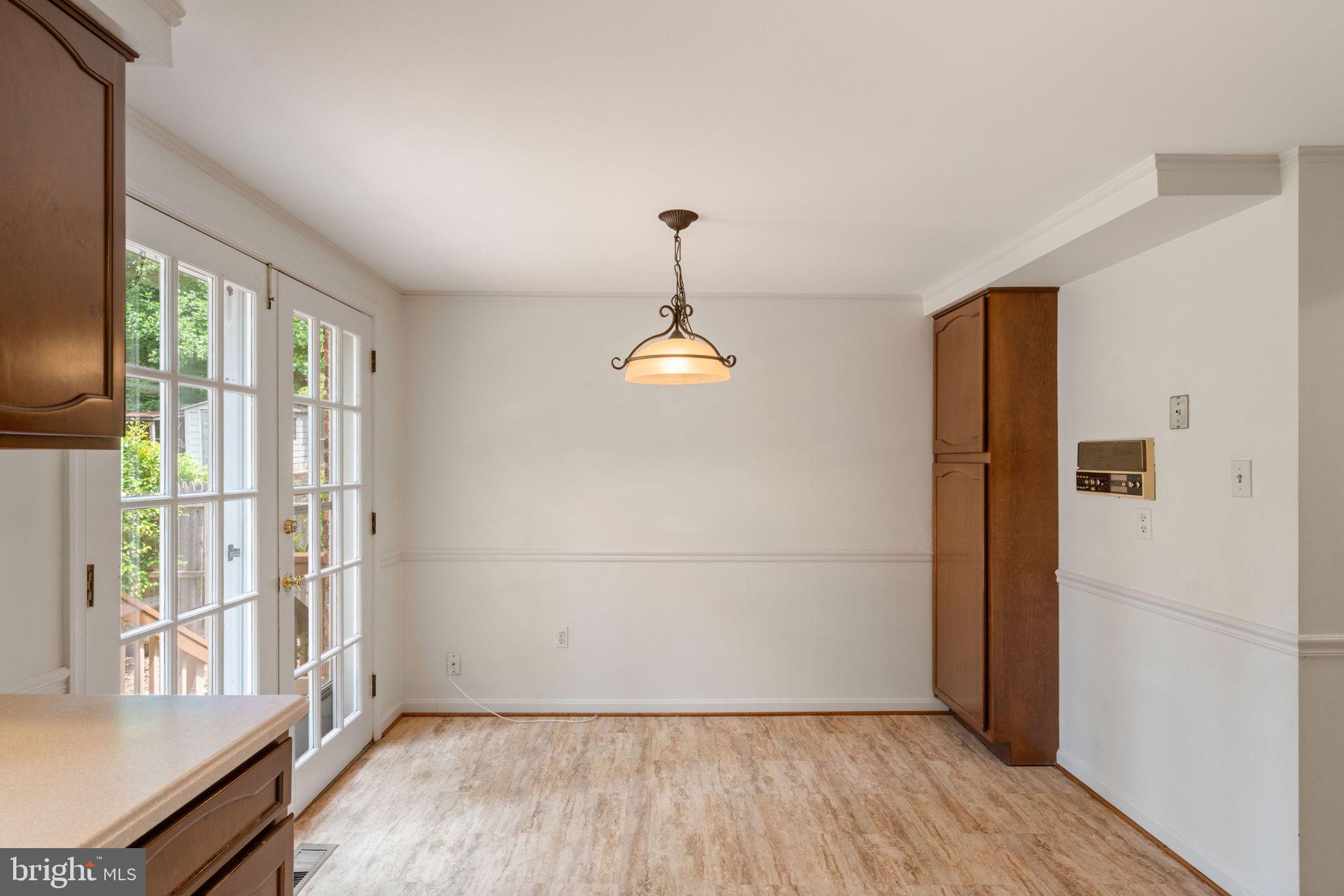 6716 Baron Road McLean, VA 22101 - Photo 21 of 41 wooden floor in an empty room with a window