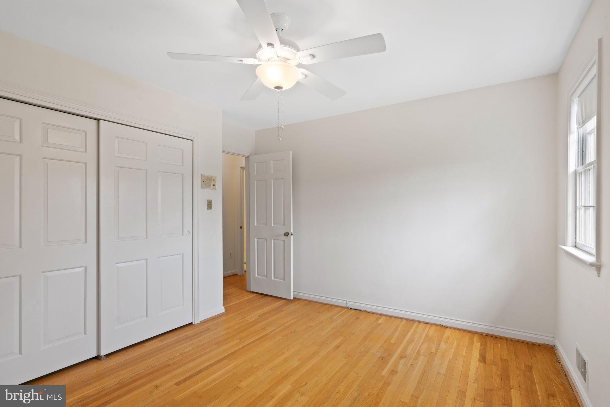6716 Baron Road McLean, VA 22101 - Photo 23 of 41 a view of an empty room with wooden floor