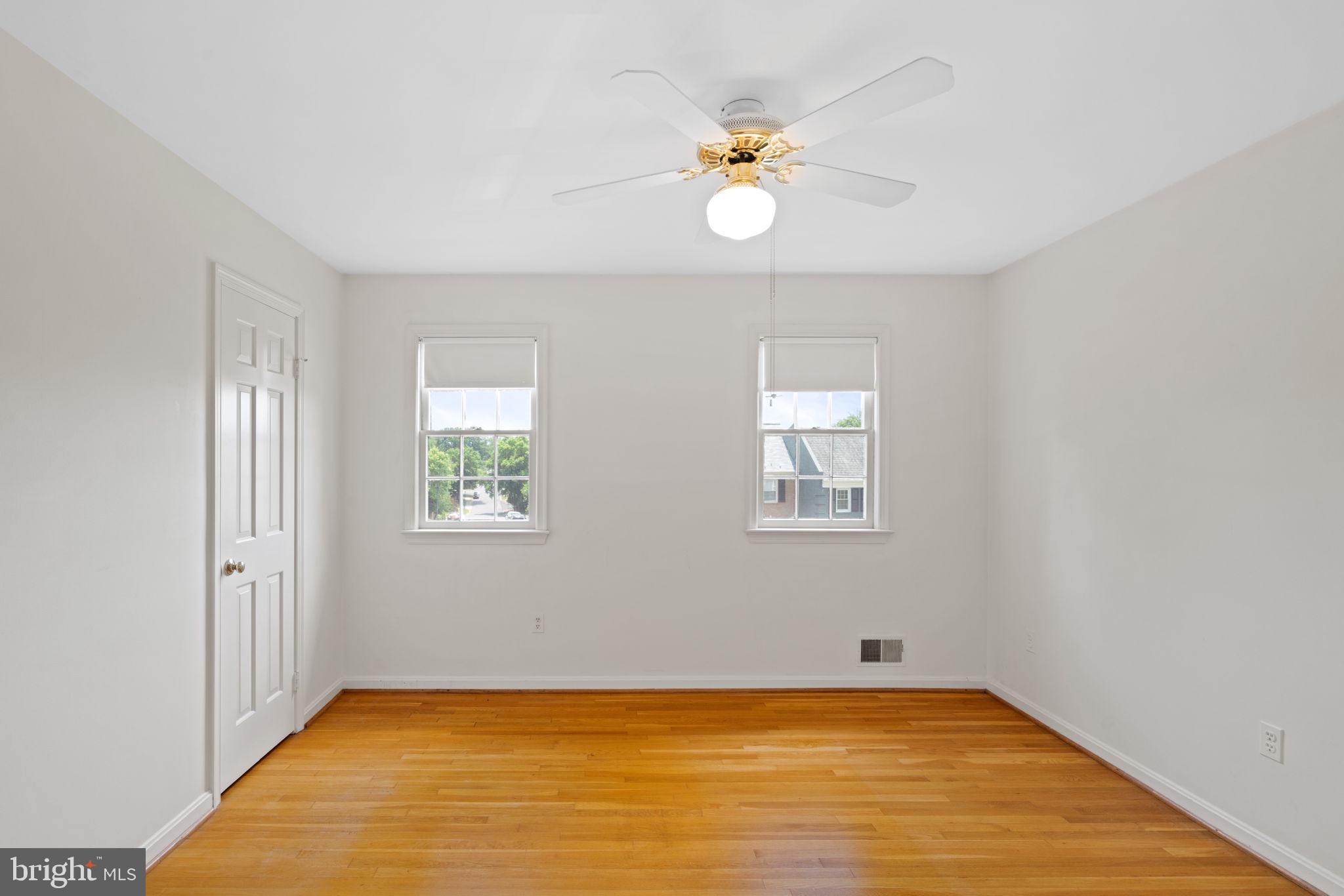6716 Baron Road McLean, VA 22101 - Photo 24 of 41 wooden floor in an empty room with a window