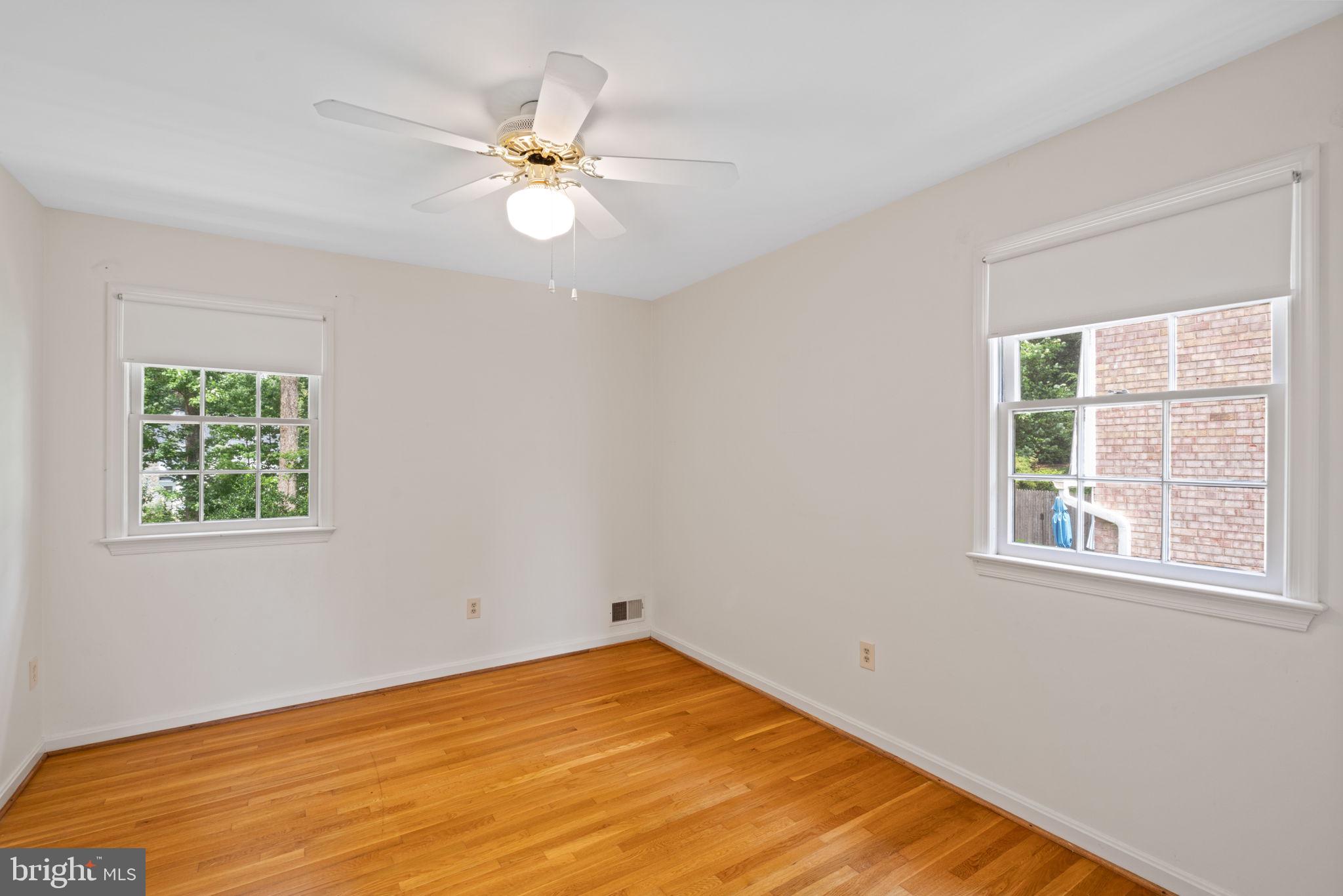 6716 Baron Road McLean, VA 22101 - Photo 27 of 41 wooden floor in an empty room with a window