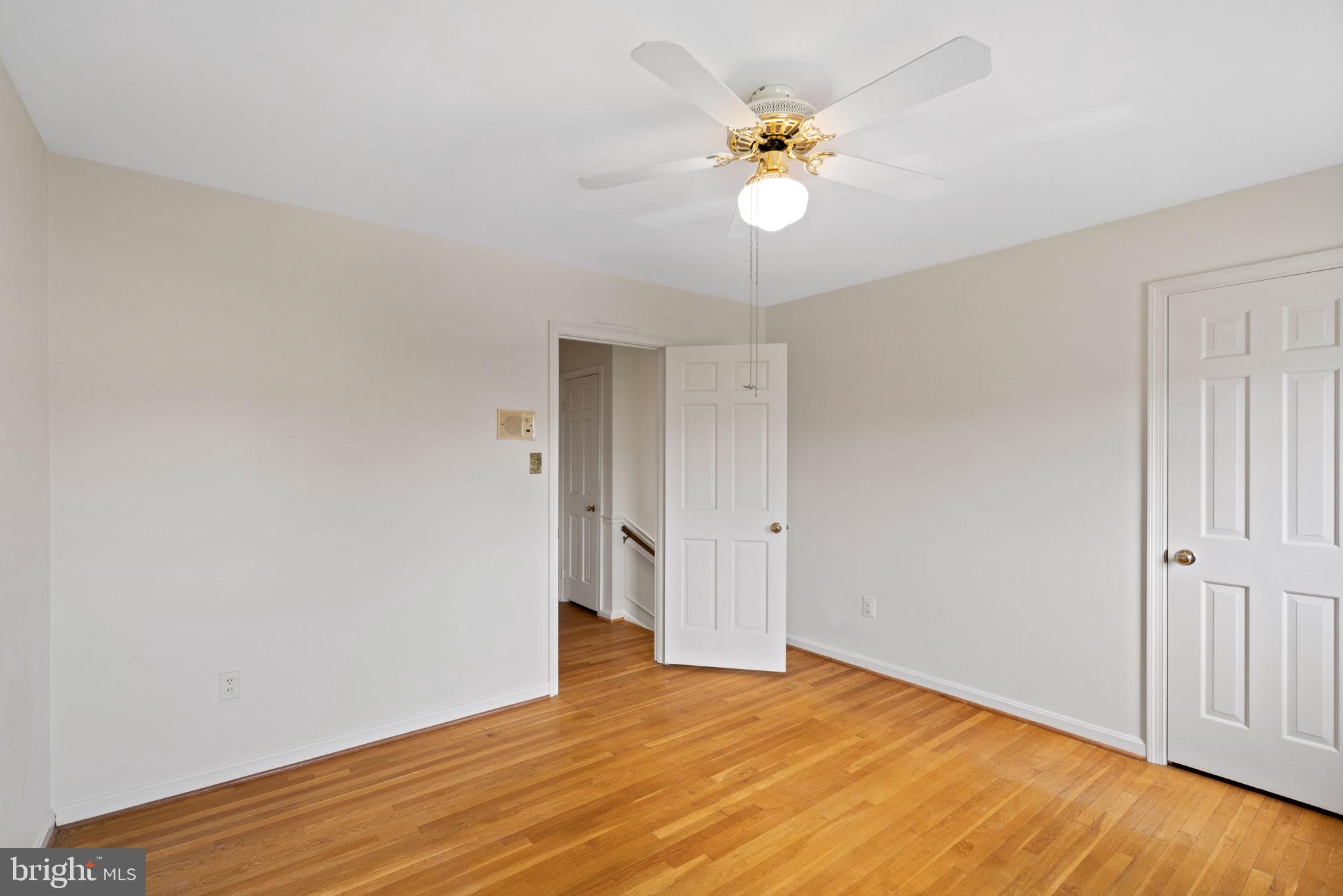 6716 Baron Road McLean, VA 22101 - Photo 28 of 41 a view of an empty room with wooden floor