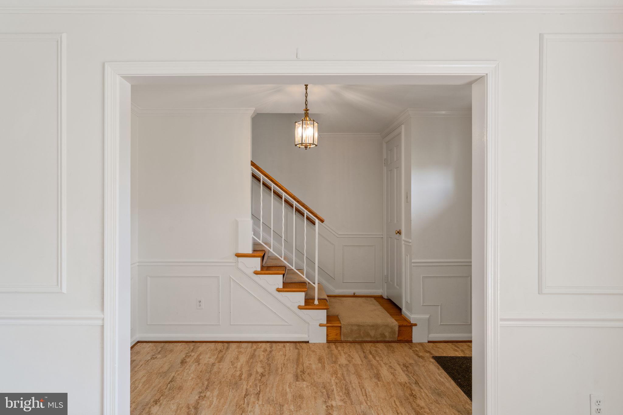 6716 Baron Road McLean, VA 22101 - Photo 34 of 41 a view of entryway and hall with wooden floor