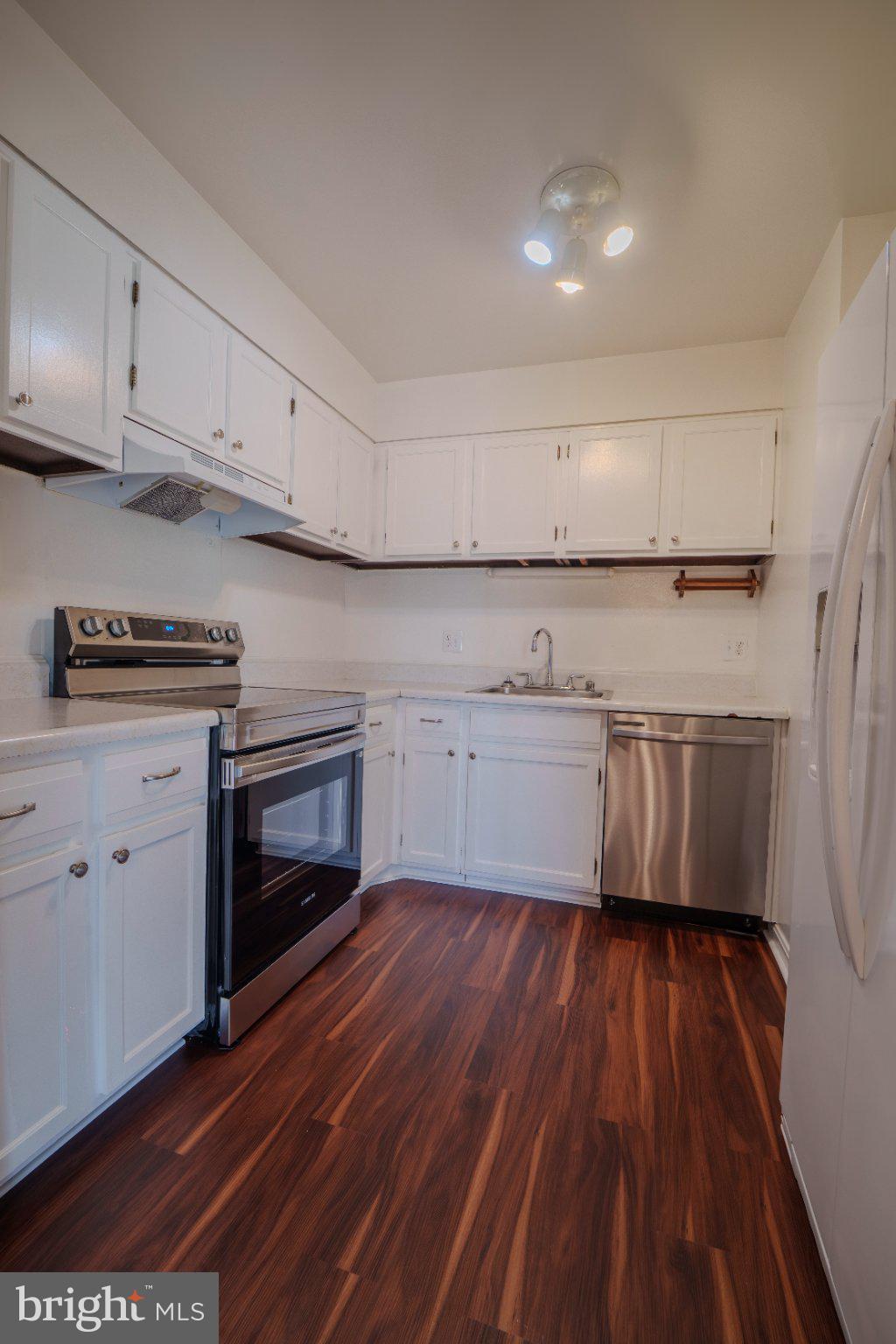 6147 Edsall Road, Unit N Alexandria, VA 22304 - Photo 11 of 28 Modern kitchen with sleek finishes.