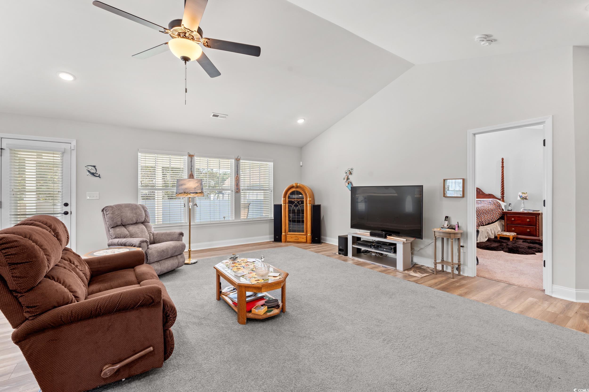 132 Fox Den Drive Murrells Inlet, SC 29576 - Photo 2 of 35 Living area with vaulted ceiling, light wood-style flooring, a ceiling fan, and recessed lighting