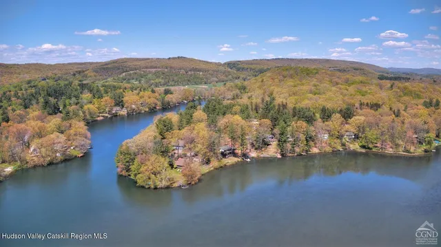 a view of a lake with a mountain in the background