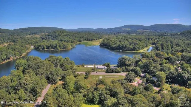 a view of lake with mountain