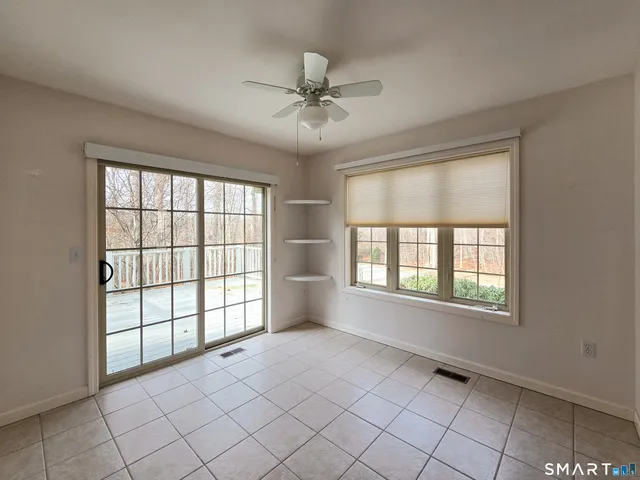 a room with furniture and a flat screen tv