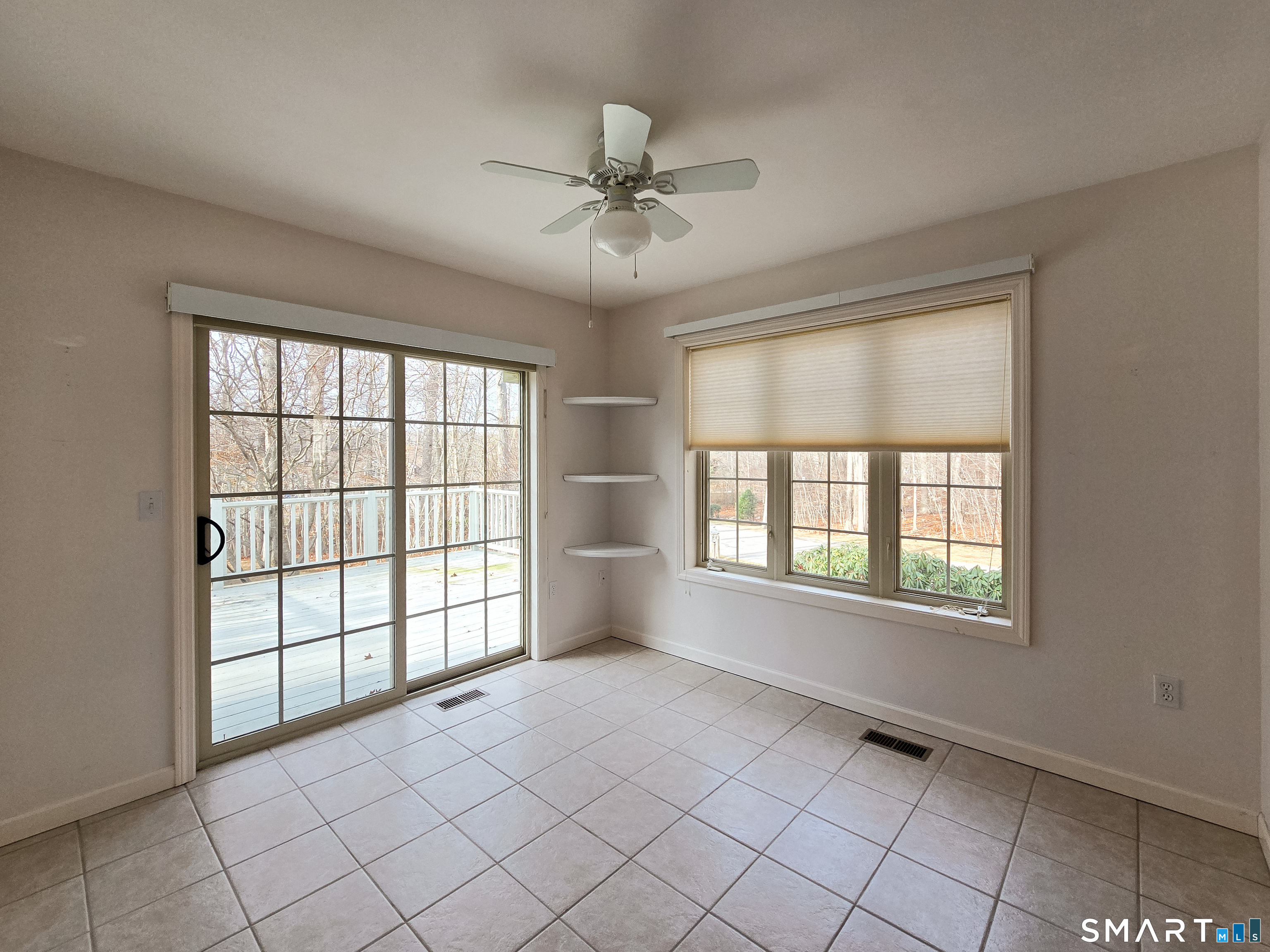 1 Bittersweet Lane, Unit 1 East Lyme, CT 06357 - Photo 15 of 35 a view of an empty room with a window