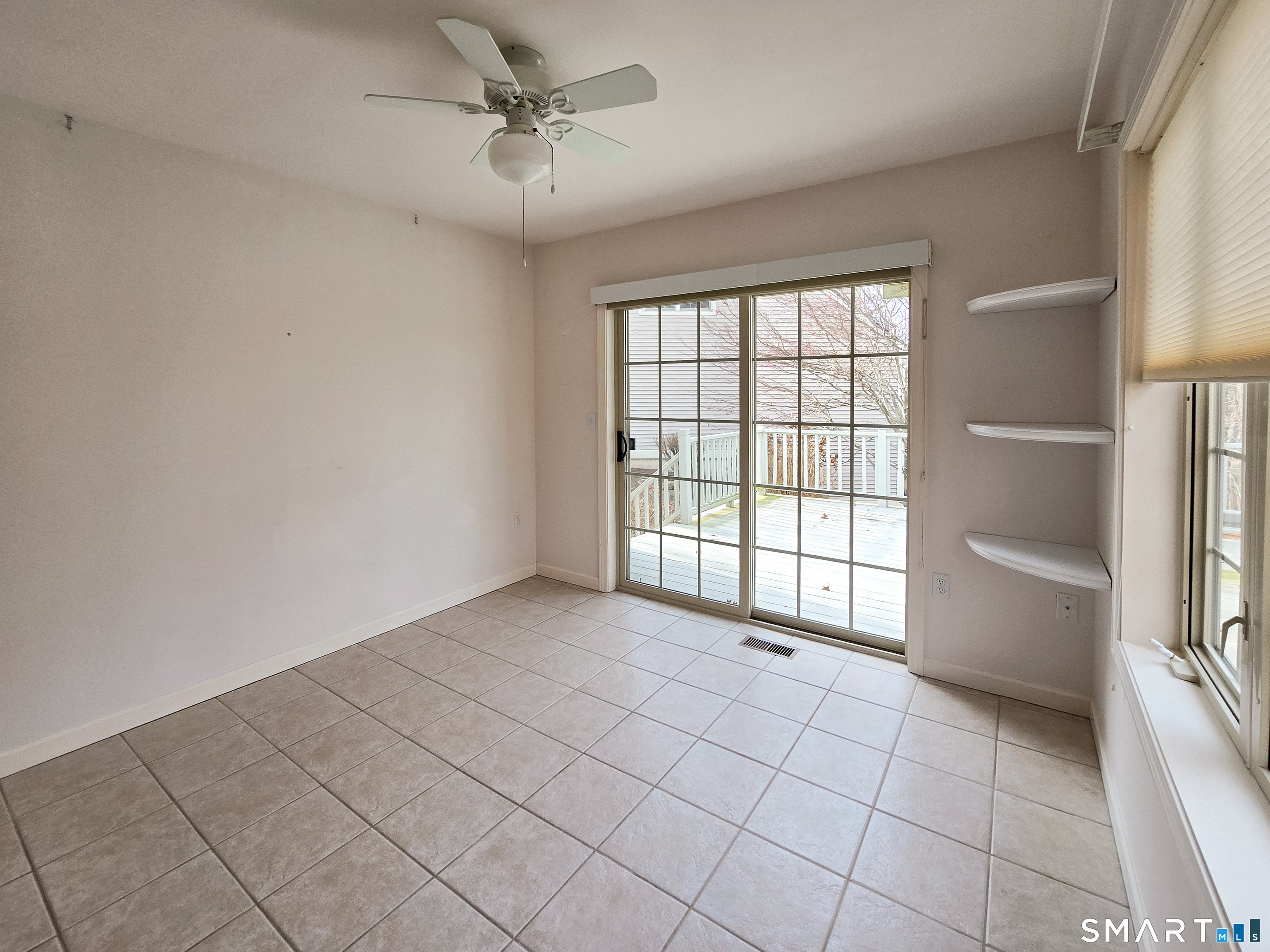 1 Bittersweet Lane, Unit 1 East Lyme, CT 06357 - Photo 16 of 35 a view of an empty room with a window