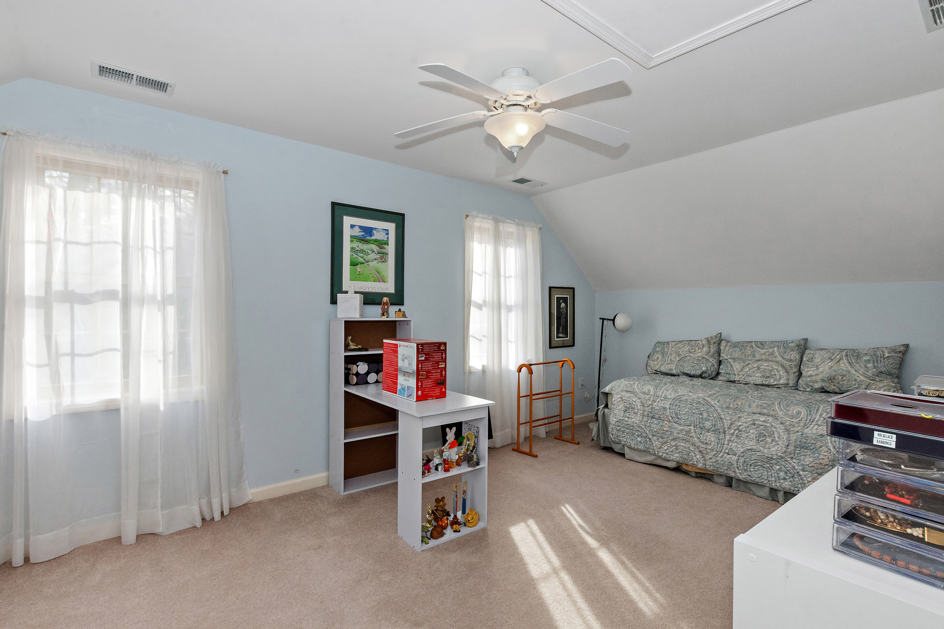 1 Bittersweet Lane, Unit 1 East Lyme, CT 06357 - Photo 26 of 35 a living room with furniture and a window