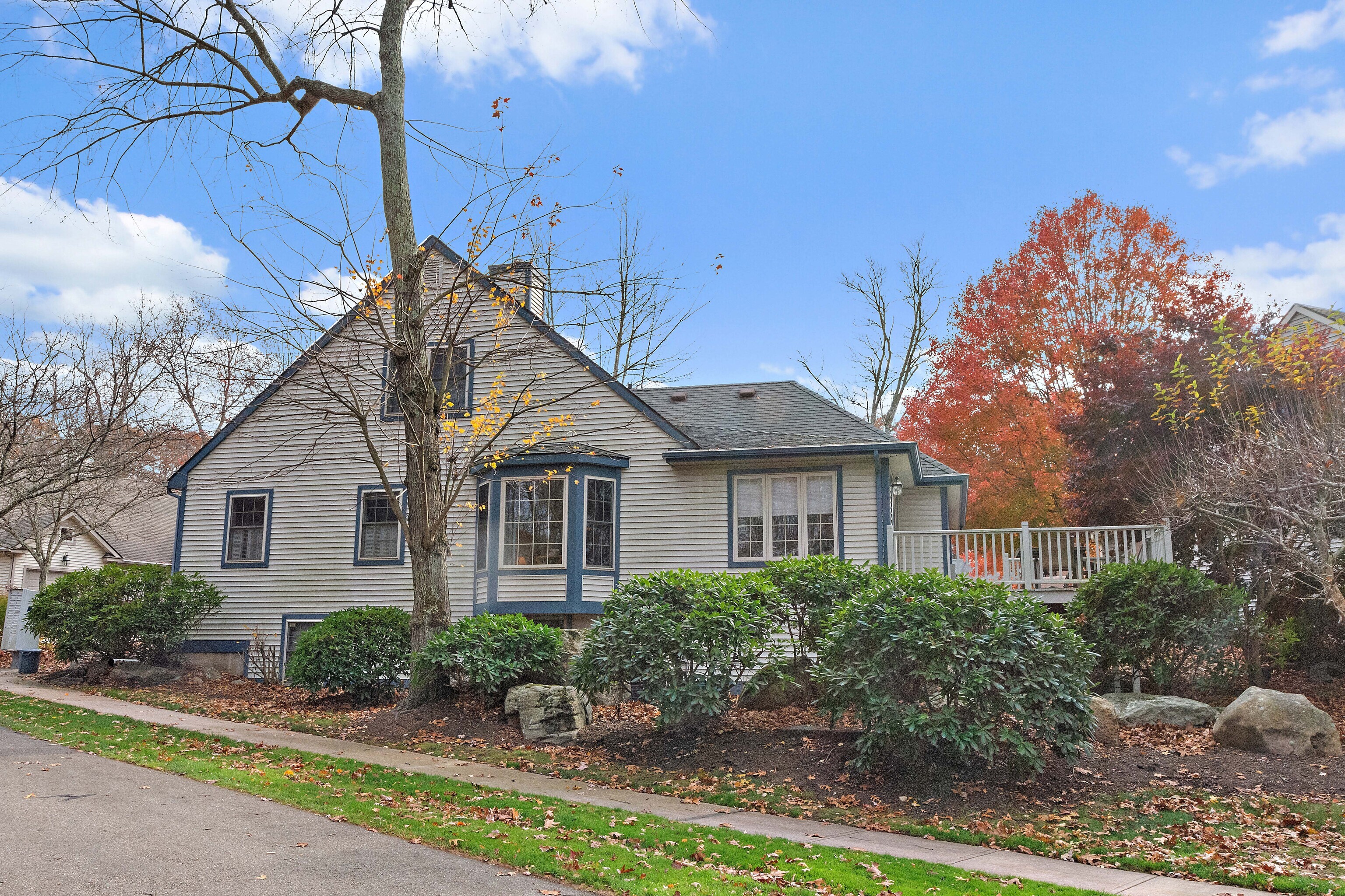 1 Bittersweet Lane, Unit 1 East Lyme, CT 06357 - Photo 32 of 35 a front view of a house with a yard