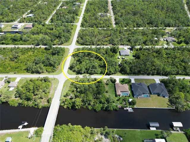 an aerial view of a house with a garden
