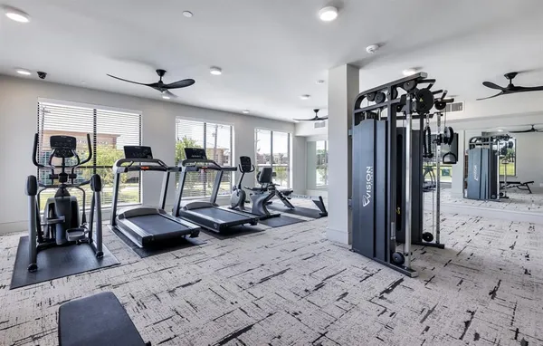 a view of a room with gym equipment