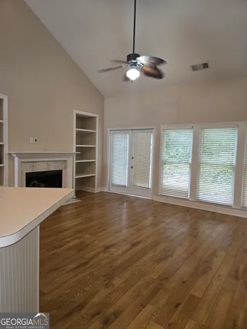 a kitchen with stainless steel appliances a stove a sink and a refrigerator