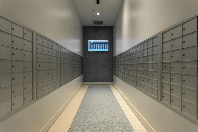 a living room with furniture and flat screen tv