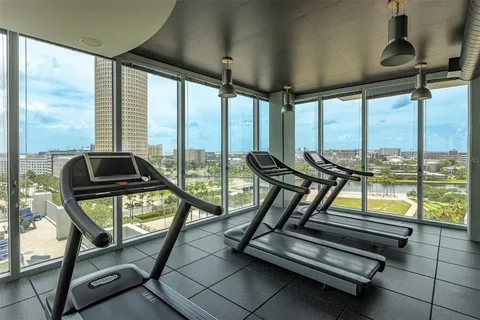 a view of a balcony with wooden floor