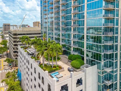 a view of a swimming pool with a table and chairs