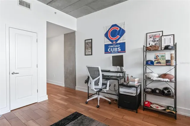 a workspace with furniture and a rug