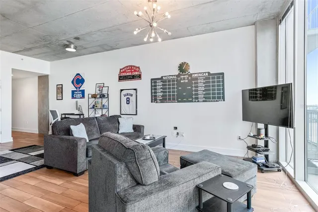 a kitchen with stainless steel appliances a refrigerator sink and microwave