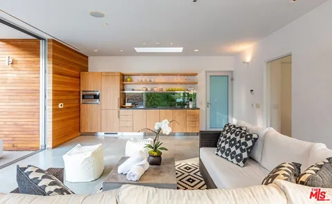 a living room with patio area