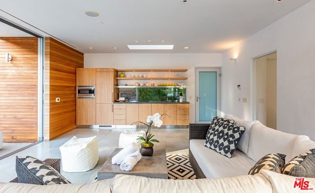 a living room with patio area