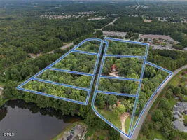 a view of a balcony with yard