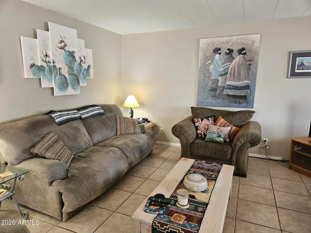 a living room with furniture and a couch