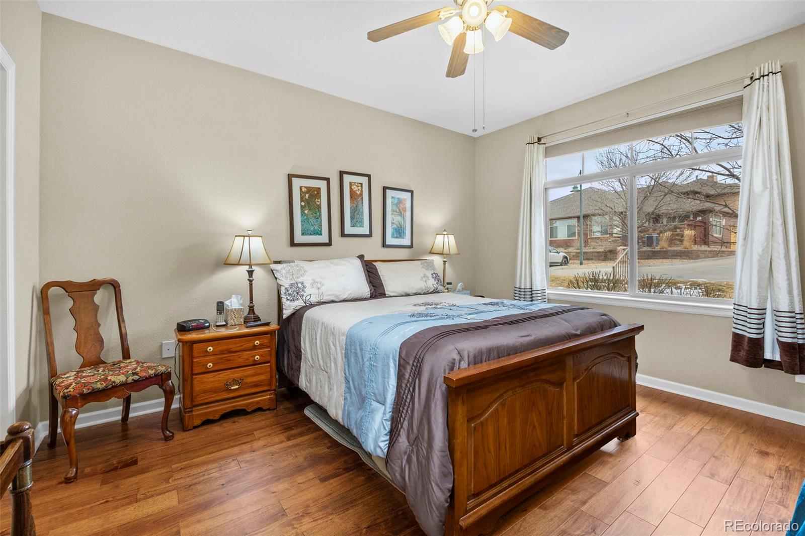 8615 Gold Peak Place, Unit F Highlands Ranch, CO 80130 - Photo 12 of 39 a bedroom with bed and window