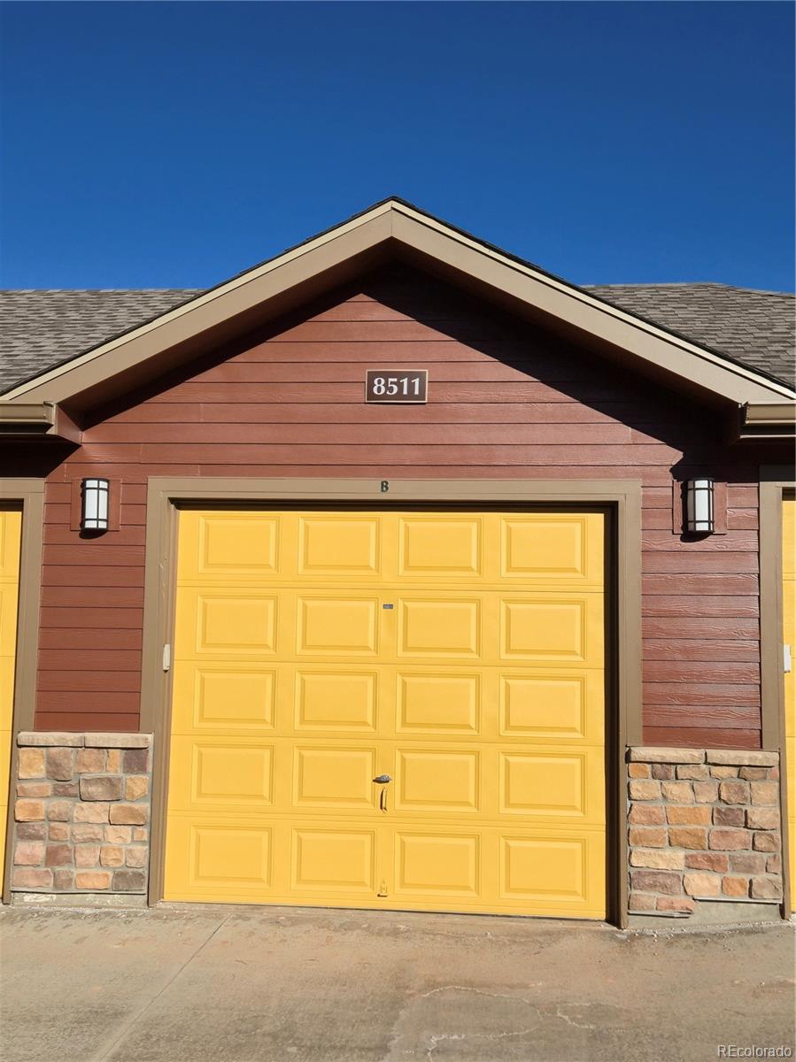 8615 Gold Peak Place, Unit F Highlands Ranch, CO 80130 - Photo 23 of 39 a front view of a building