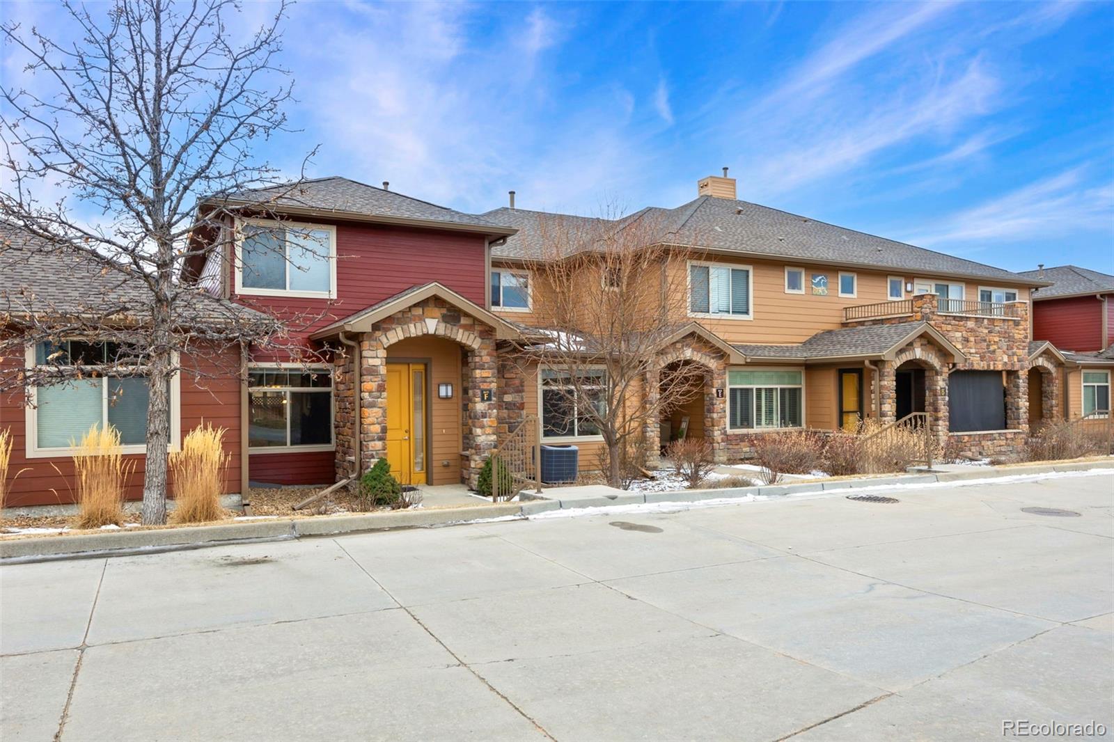 8615 Gold Peak Place, Unit F Highlands Ranch, CO 80130 - Photo 24 of 39 a front view of a building