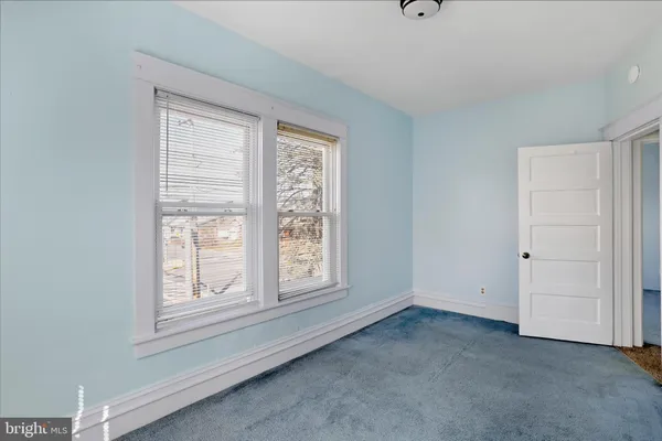 a view of a swimming pool with a lounge chairs
