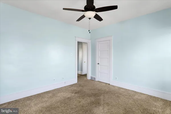 a kitchen with a sink a stove and refrigerator