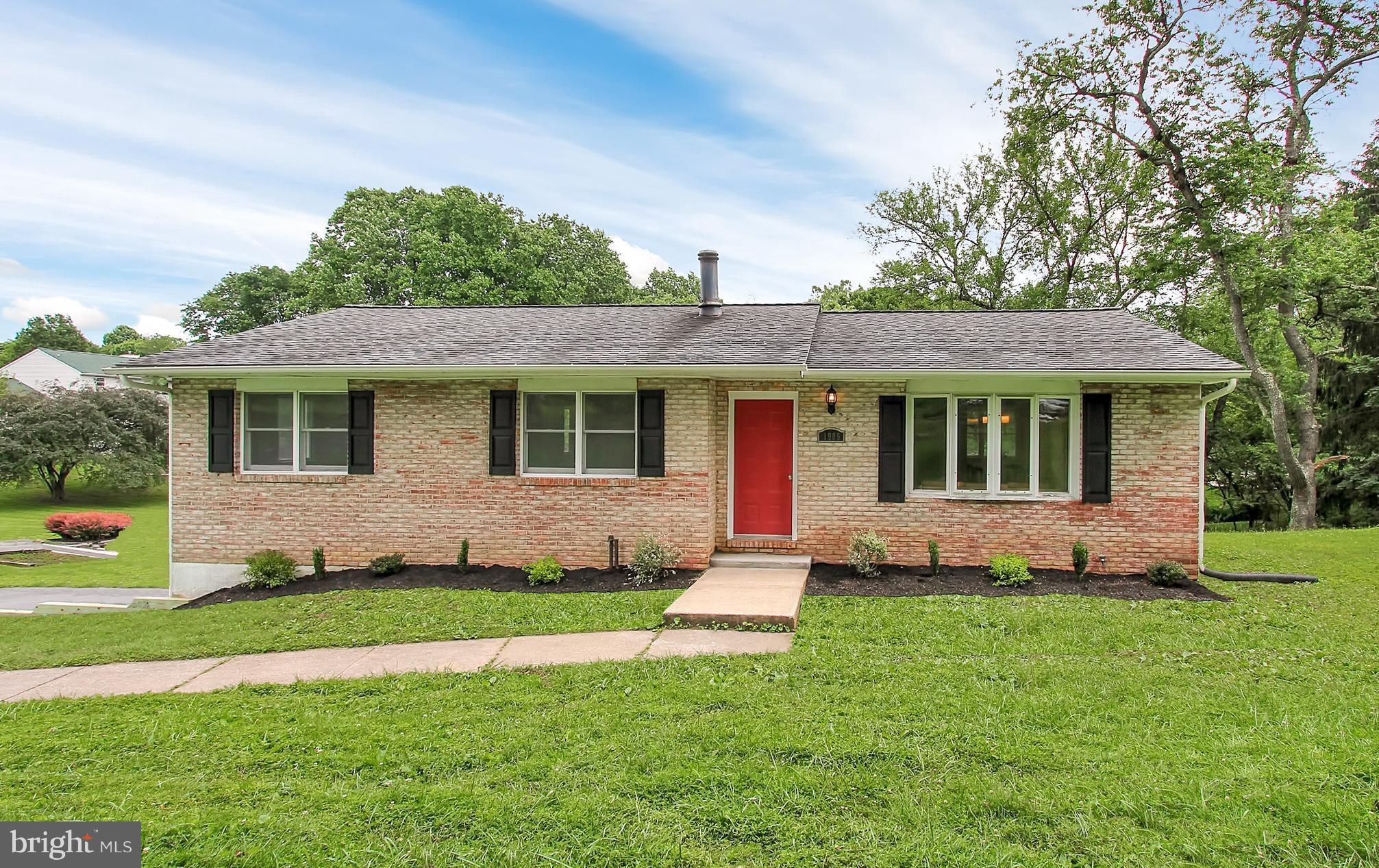 1905 Angleside Road Fallston, MD 21047 - Photo 2 of 25 a front view of a house with a garden