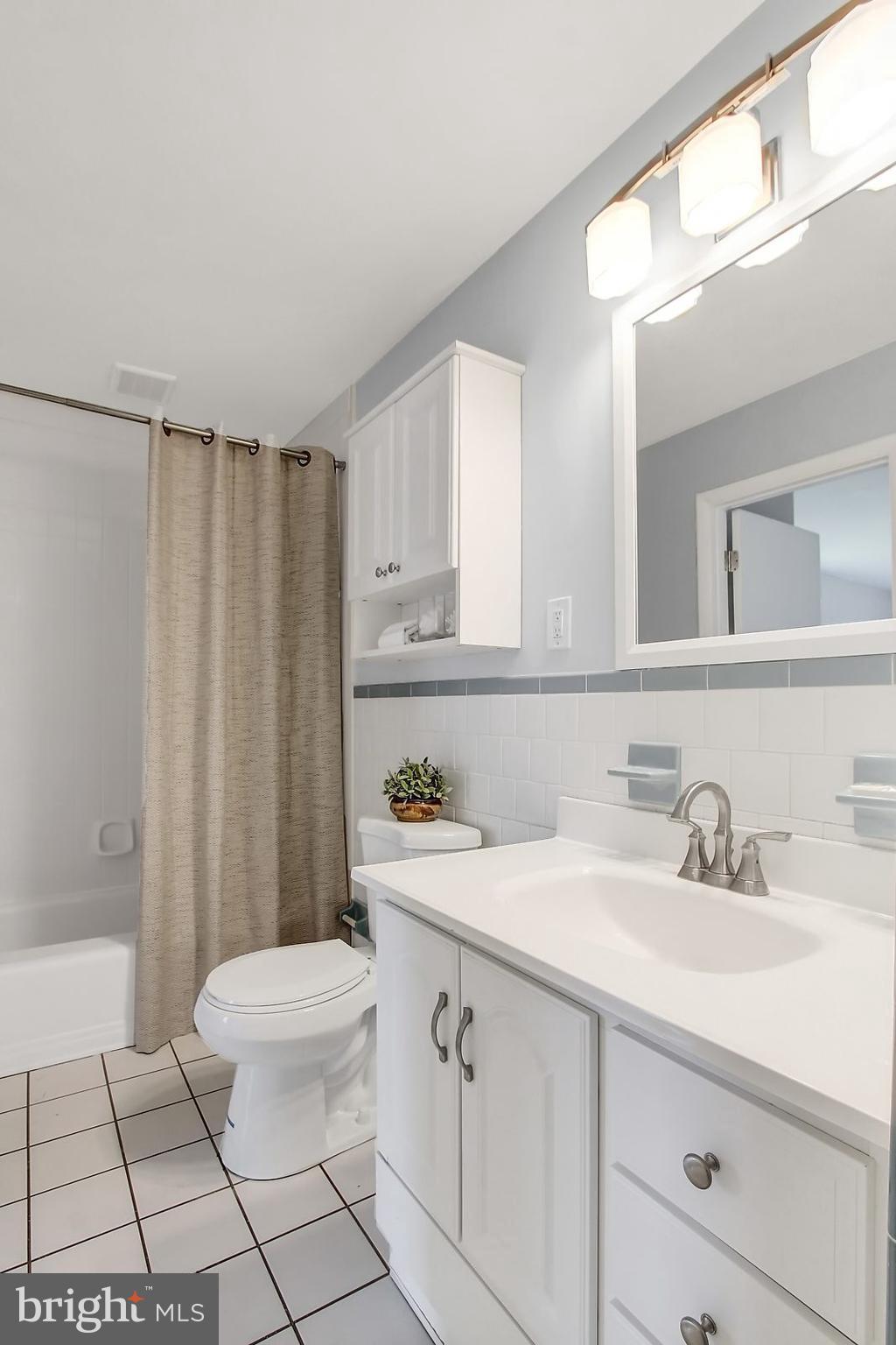 1905 Angleside Road Fallston, MD 21047 - Photo 12 of 25 a bathroom with a sink a toilet and shower
