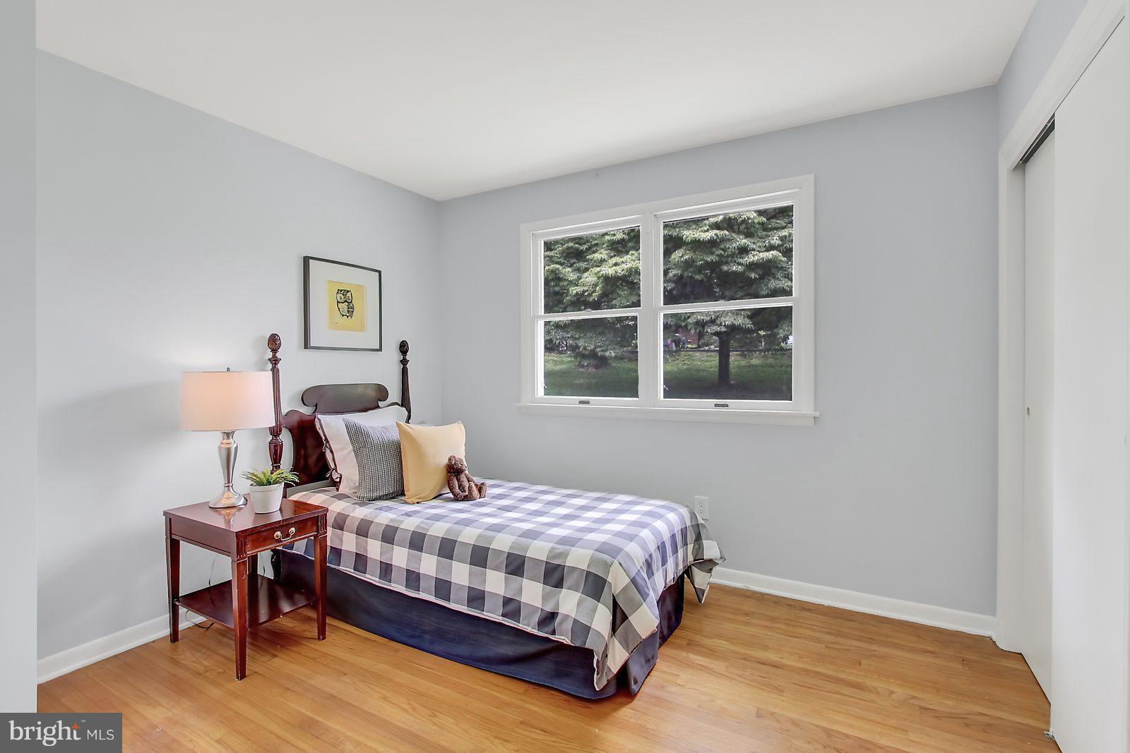 1905 Angleside Road Fallston, MD 21047 - Photo 13 of 25 a bedroom with a bed lamps and window