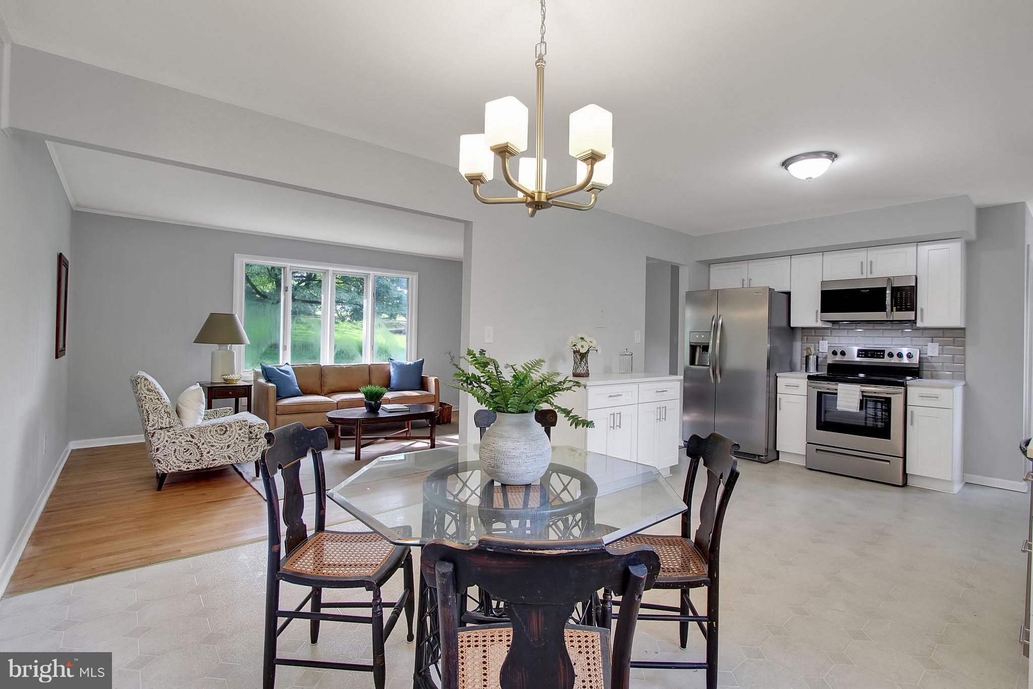 1905 Angleside Road Fallston, MD 21047 - Photo 8 of 25 a view of a dining room with furniture a chandelier and wooden floor