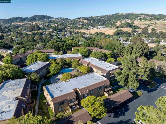 an aerial view of a house with a ocean view