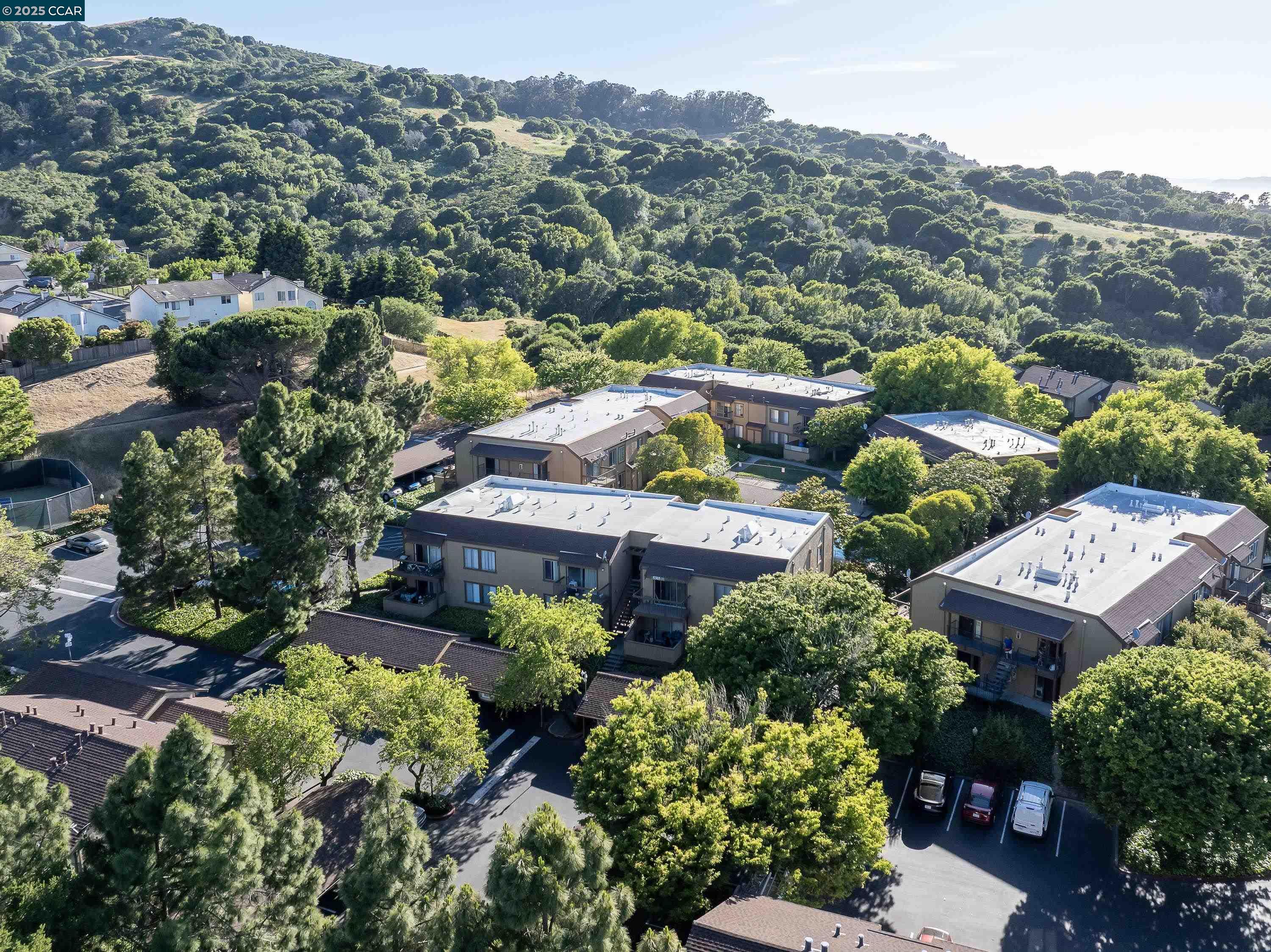 5305 Ridgeview Circle, Unit 8 El Sobrante, CA 94803 - Photo 18 of 18 an aerial view of a house with a garden