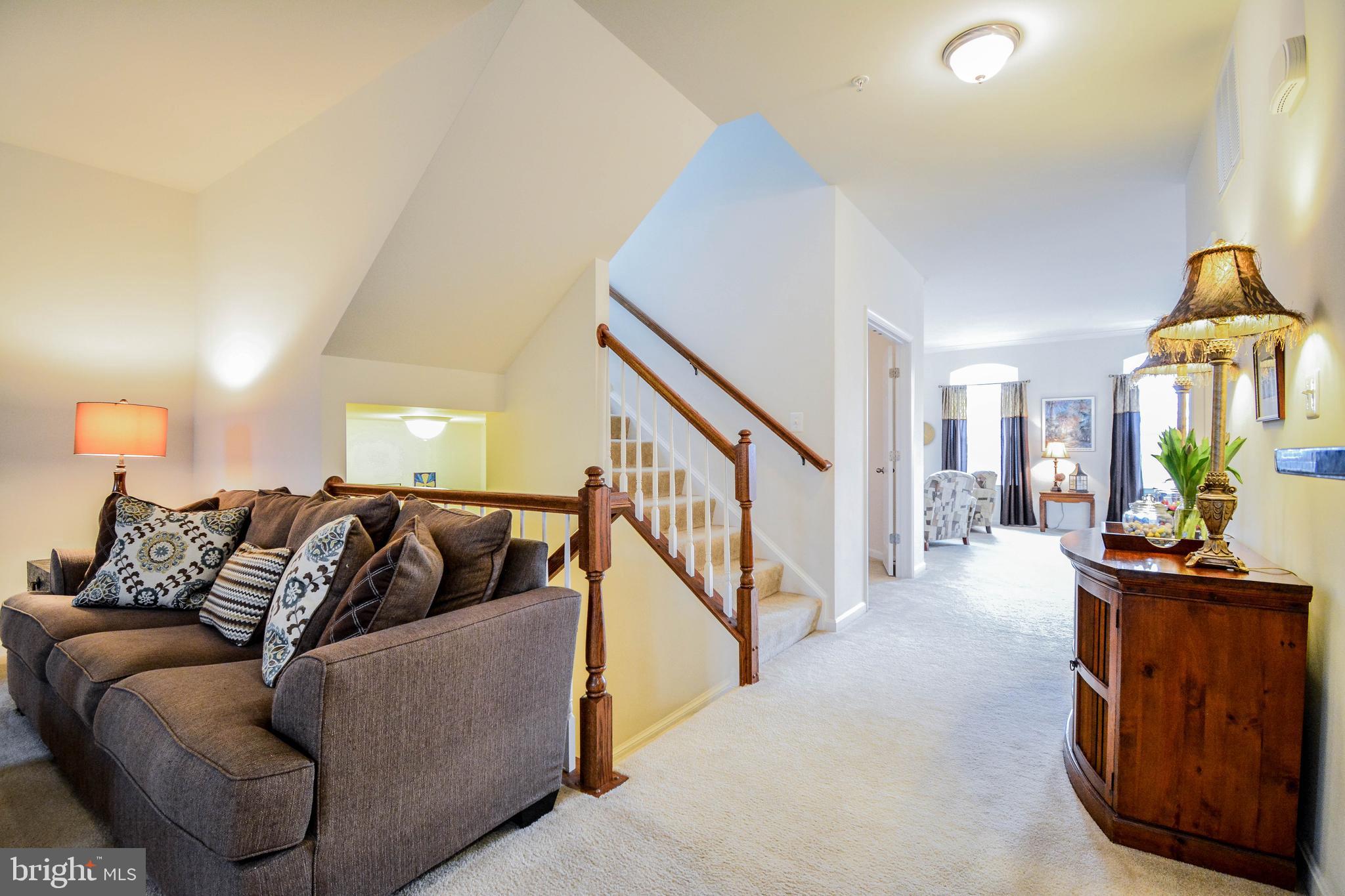 3321 Eagle Ridge Drive Woodbridge, VA 22191 - Photo 13 of 32 Family room and connecting stairs