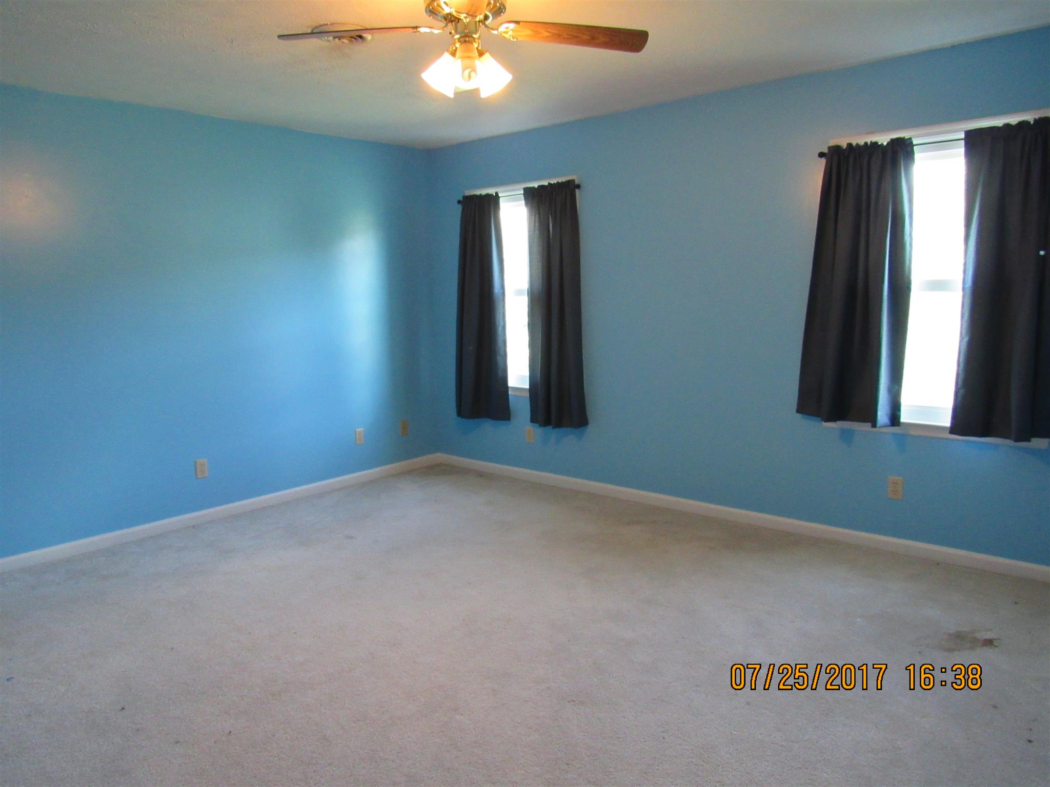 2844 Mt Zion Road Morrison, TN 37357 - Photo 24 of 28 an empty room with windows and entrance