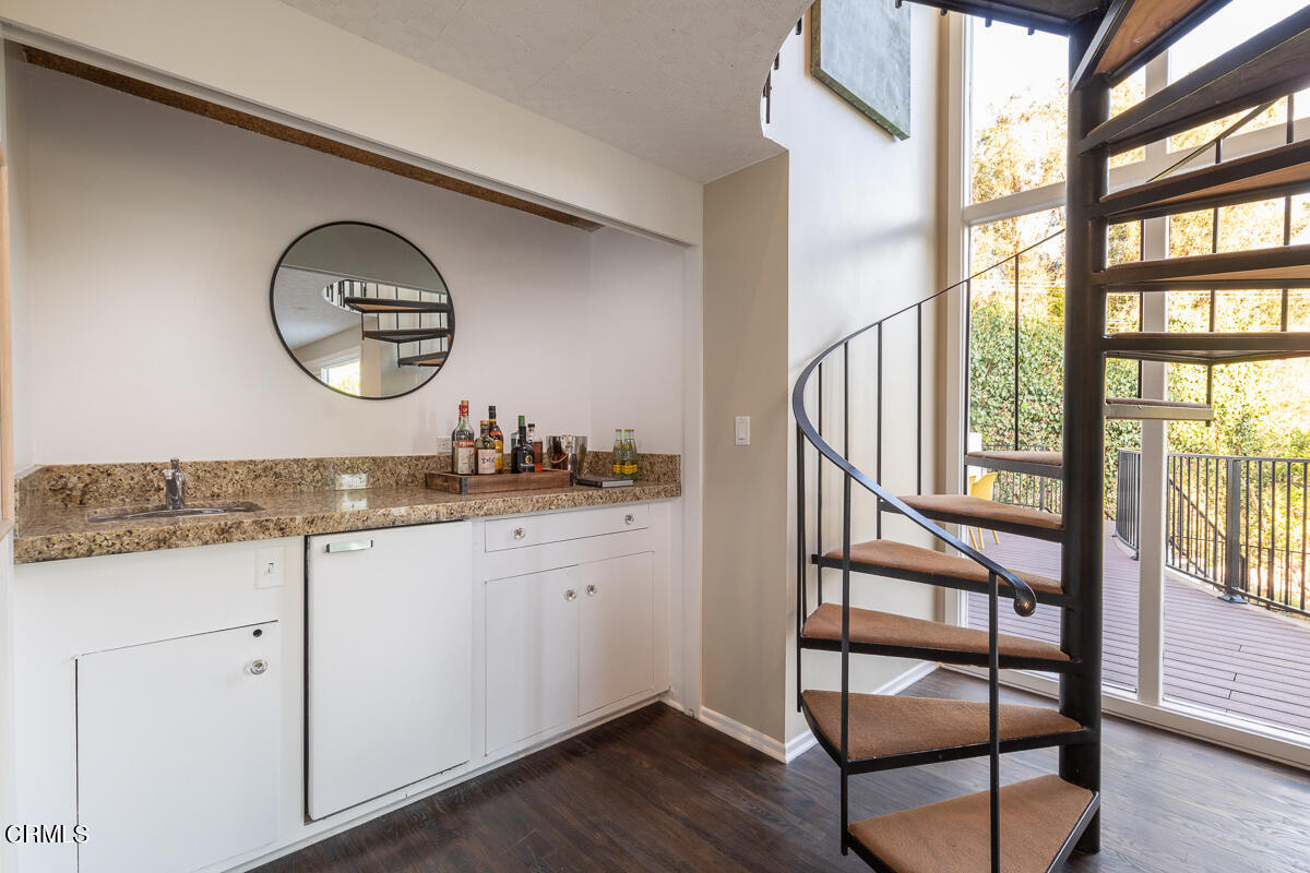 1376 Brixton Road Pasadena, CA 91105 - Photo 27 of 38 a bathroom with a granite countertop sink and a mirror