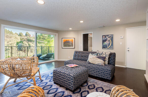 1376 Brixton Road Pasadena, CA 91105 - Photo 28 of 38 a living room with furniture and a floor to ceiling window