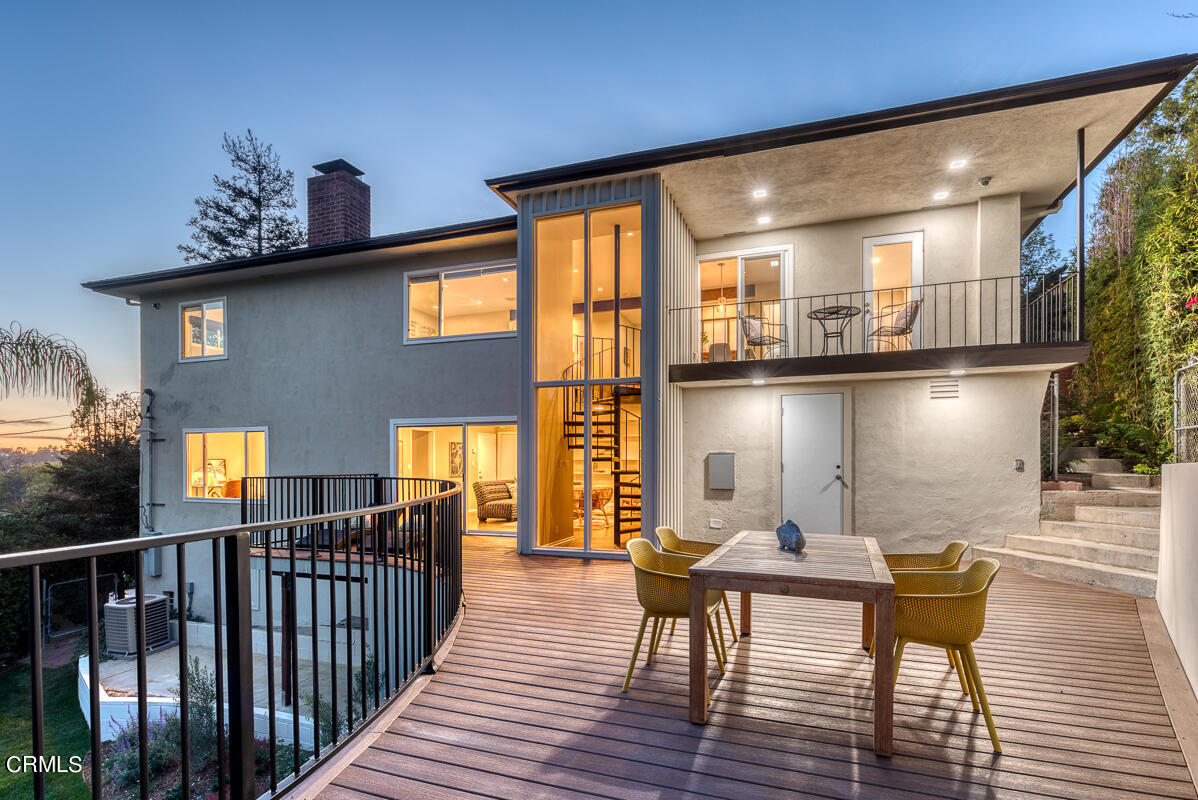 1376 Brixton Road Pasadena, CA 91105 - Photo 4 of 38 a balcony view with chairs and wooden floor
