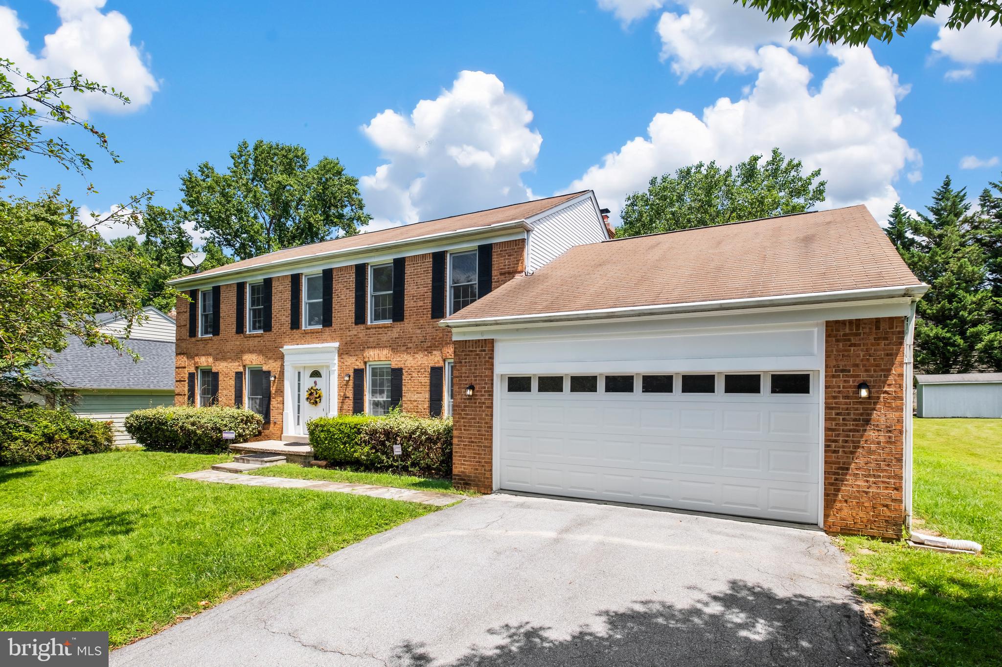 13905 Huxley Cove Court Silver Spring, MD 20906 - Photo 1 of 30 a house with a garden view
