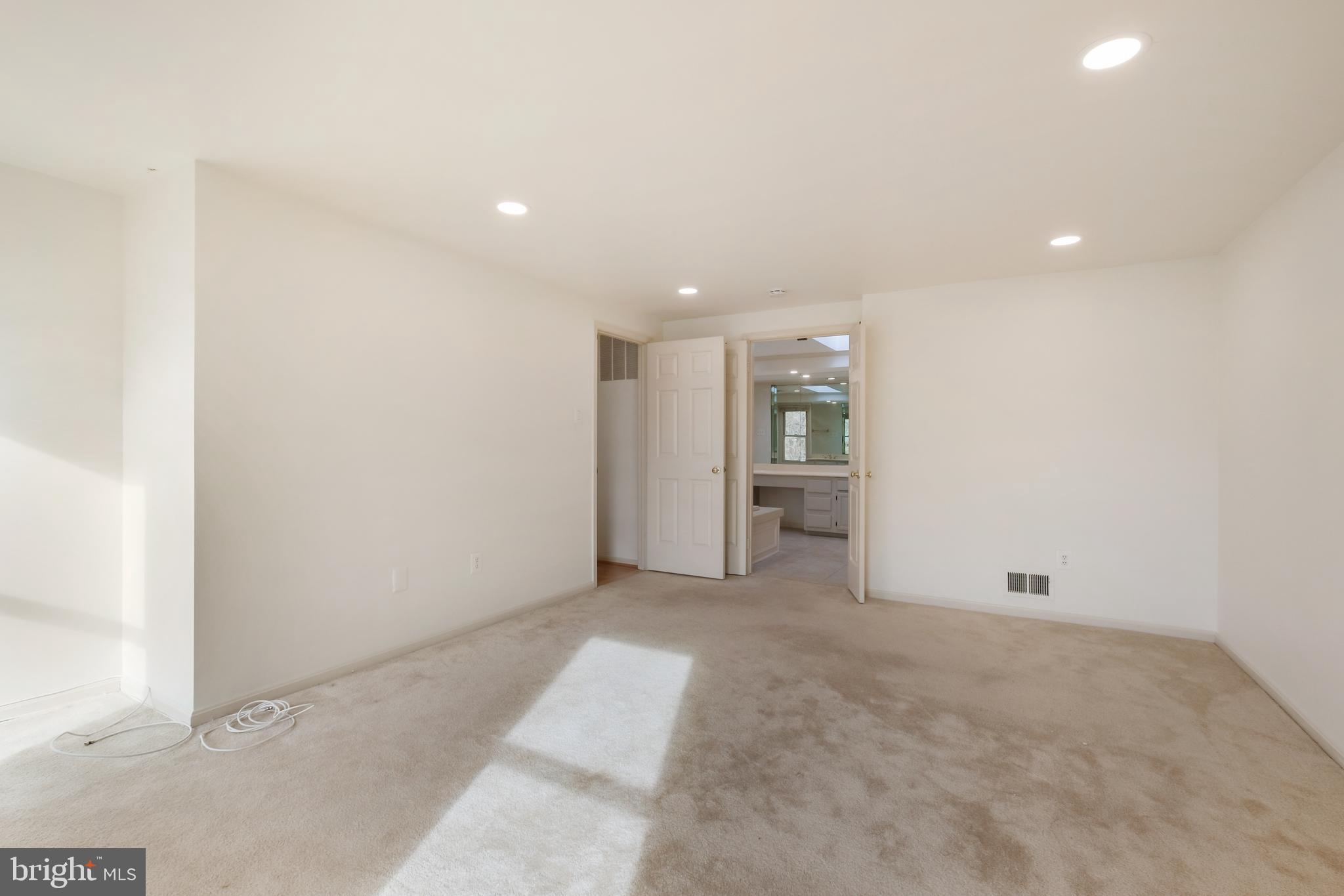 13905 Huxley Cove Court Silver Spring, MD 20906 - Photo 24 of 30 a view of a livingroom with an empty space